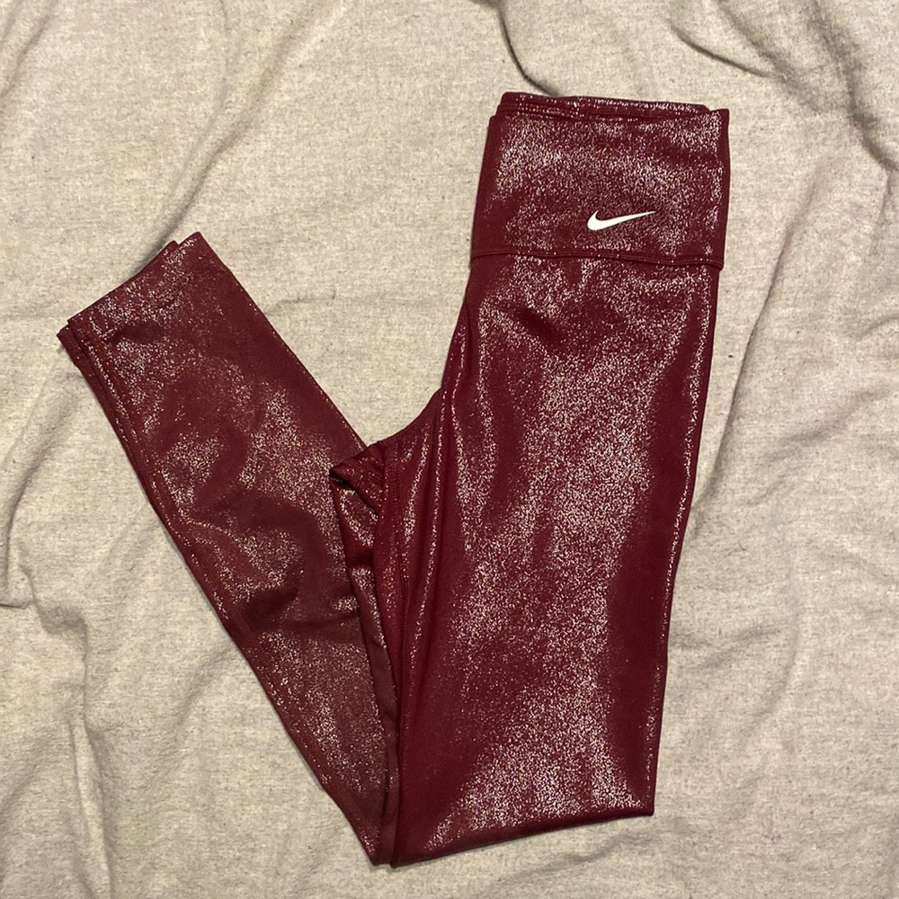 Shiny maroon Nike leggings